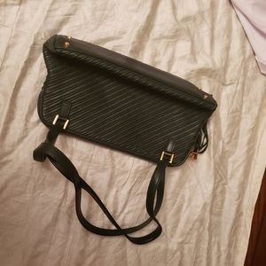 A beautiful green ST John handbag.